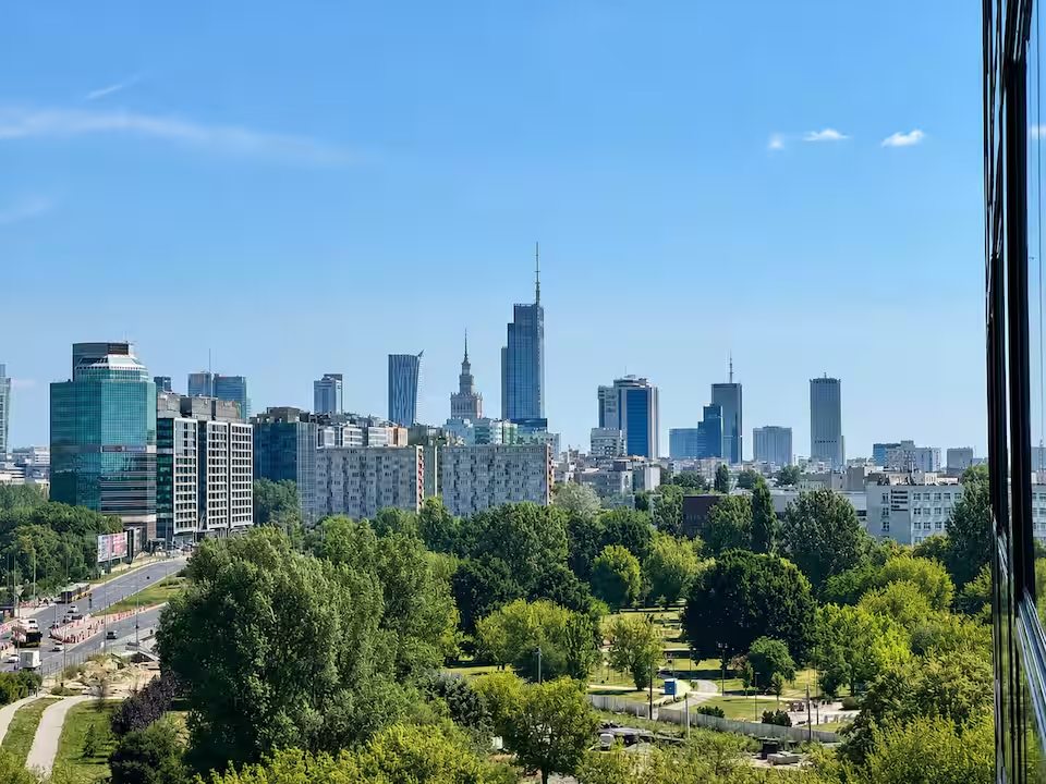 Real view from the apartment balcony towards the Warsaw skyline and Palace of Culture and Science